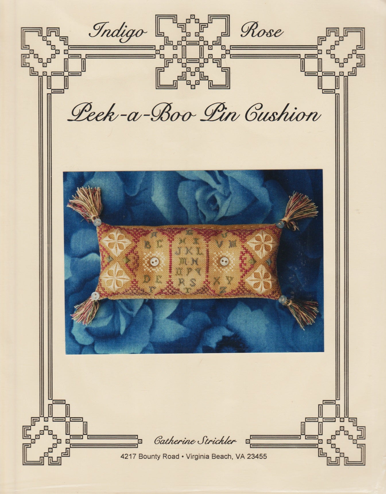 Indigo Rose Peek-a-Boo Pin Cushion cross stitch pattern