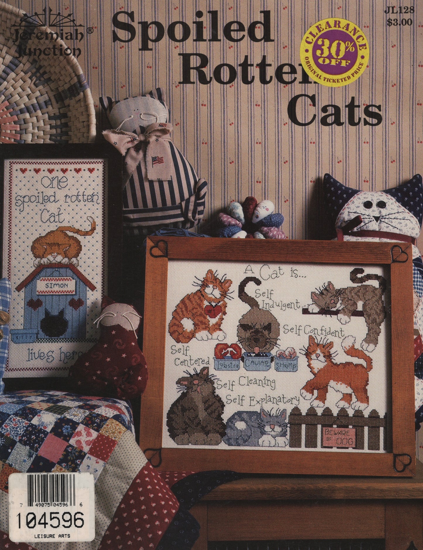 Cross-stitch pattern cover for 'Spoiled Rotten Cats' by Jerimiah Junction, featuring various illustrated cats. JL128