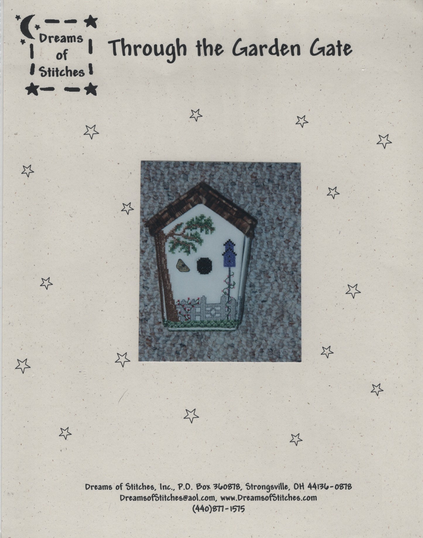 A vintage pattern cover for 'Through the Garden Gate' by Dreams of Stitches, featuring a central illustration of a birdhouse with a garden scene on a textured gray background, surrounded by small star illustrations