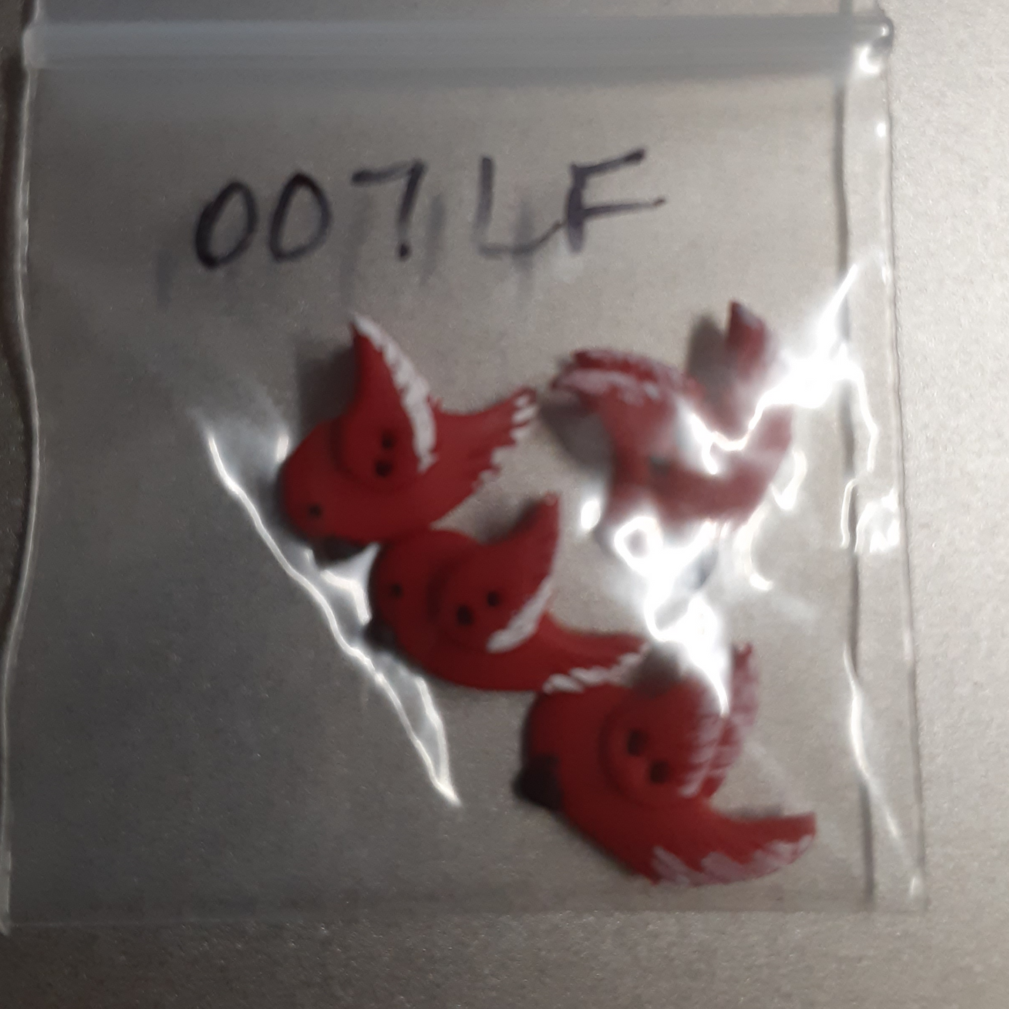 Stoney Creek Left-Facing Red Bird button