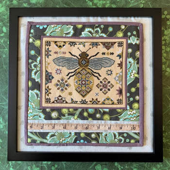 The Blue Flower Quilting Bee cross stitch pattern