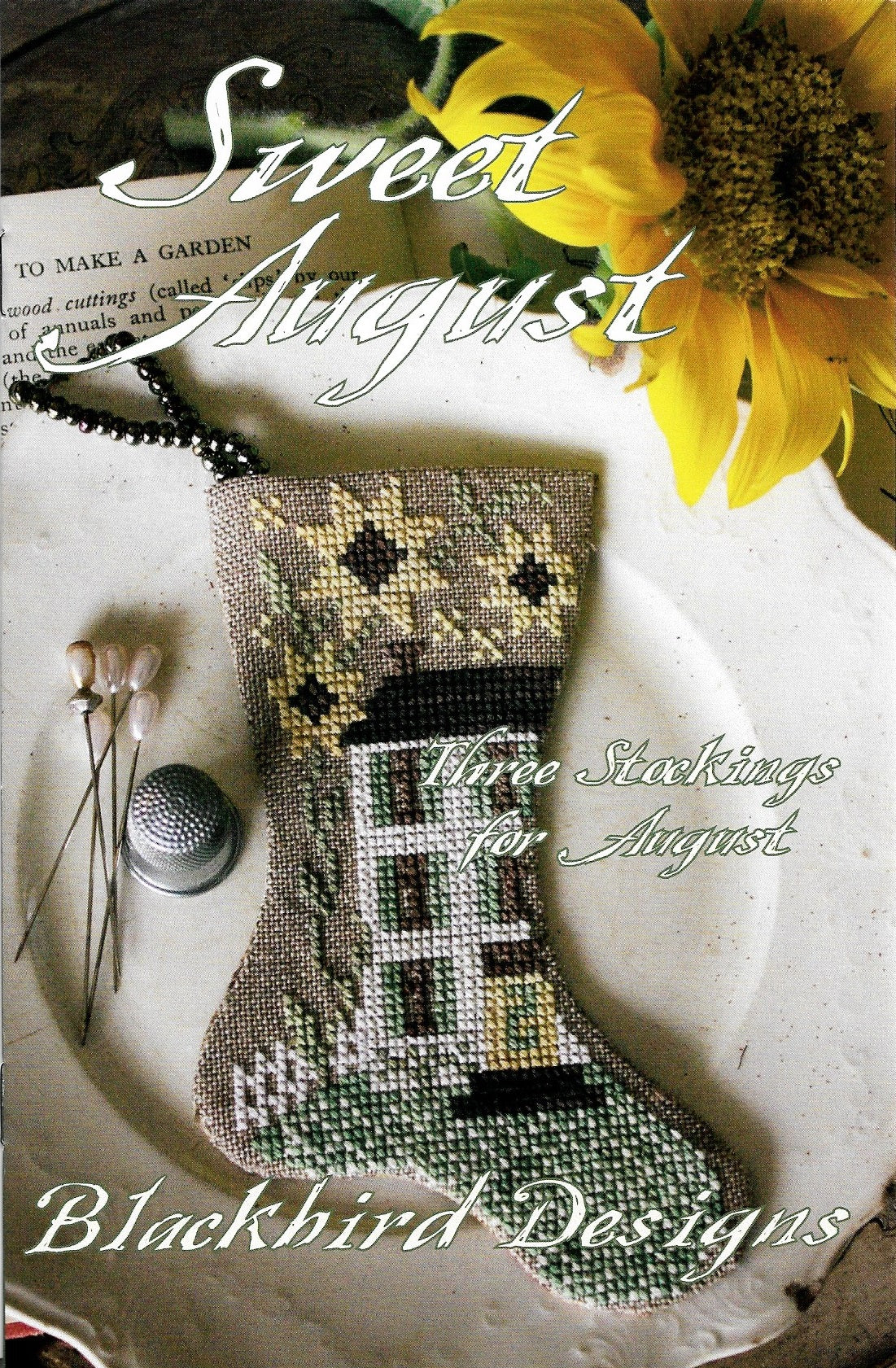 Blackbird Designs Sweet August stockings cross stitch pattern