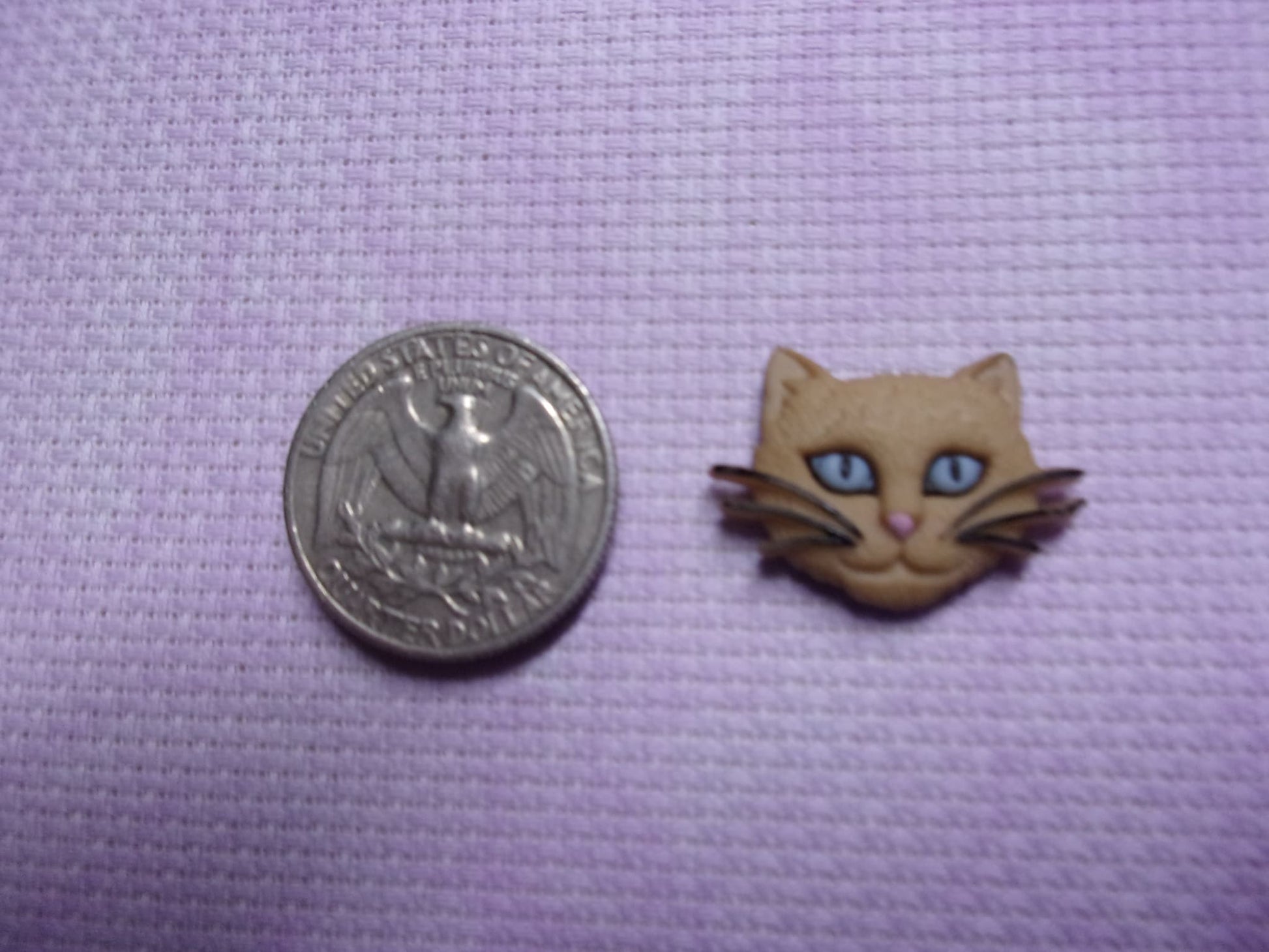 Cat Head Needle Minders Tan