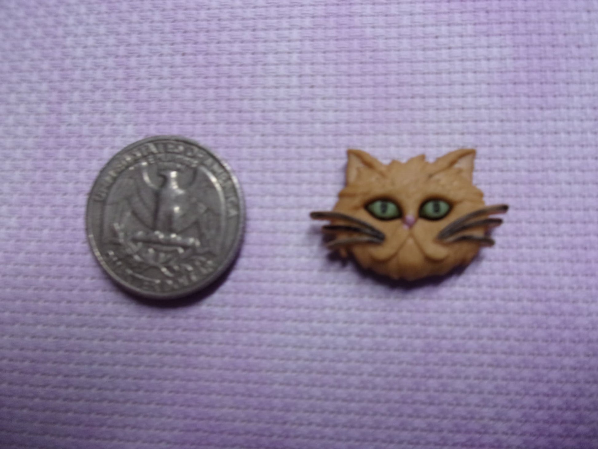 Cat Head Needle Minders Orange