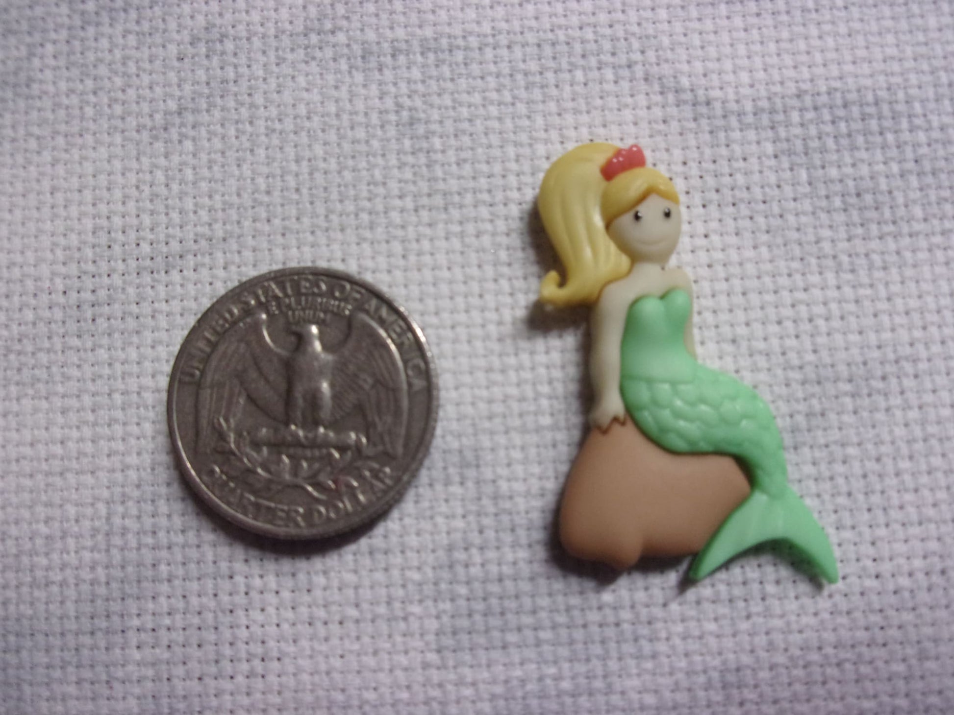 Mermaids Needle Minders On Rock