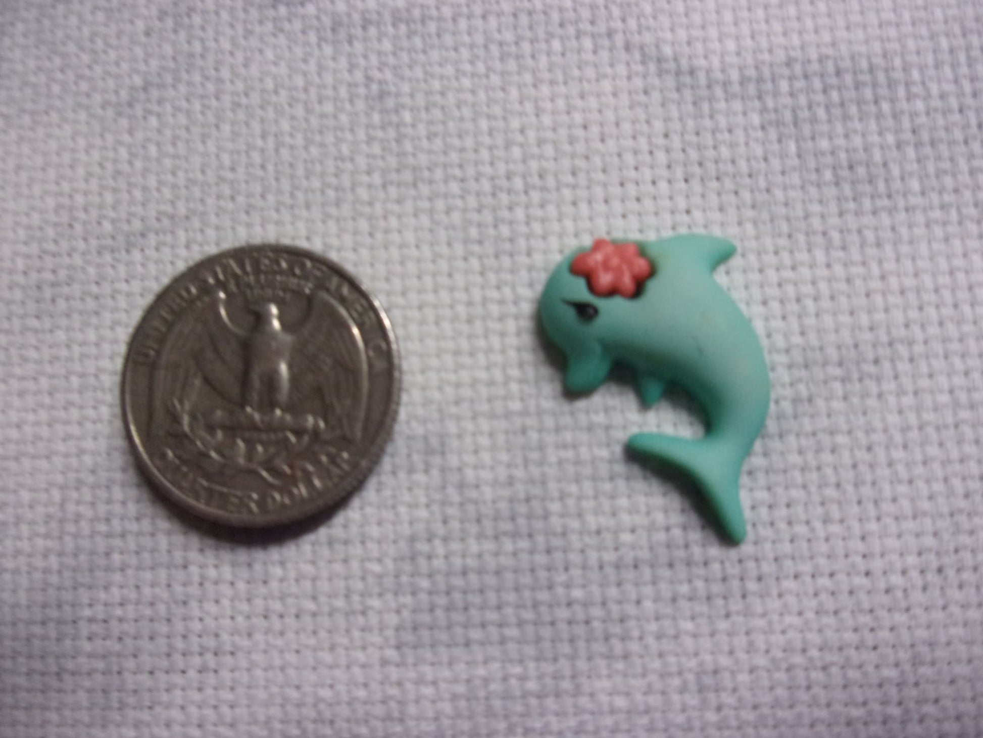 Mermaids Needle Minders Left Dolphin