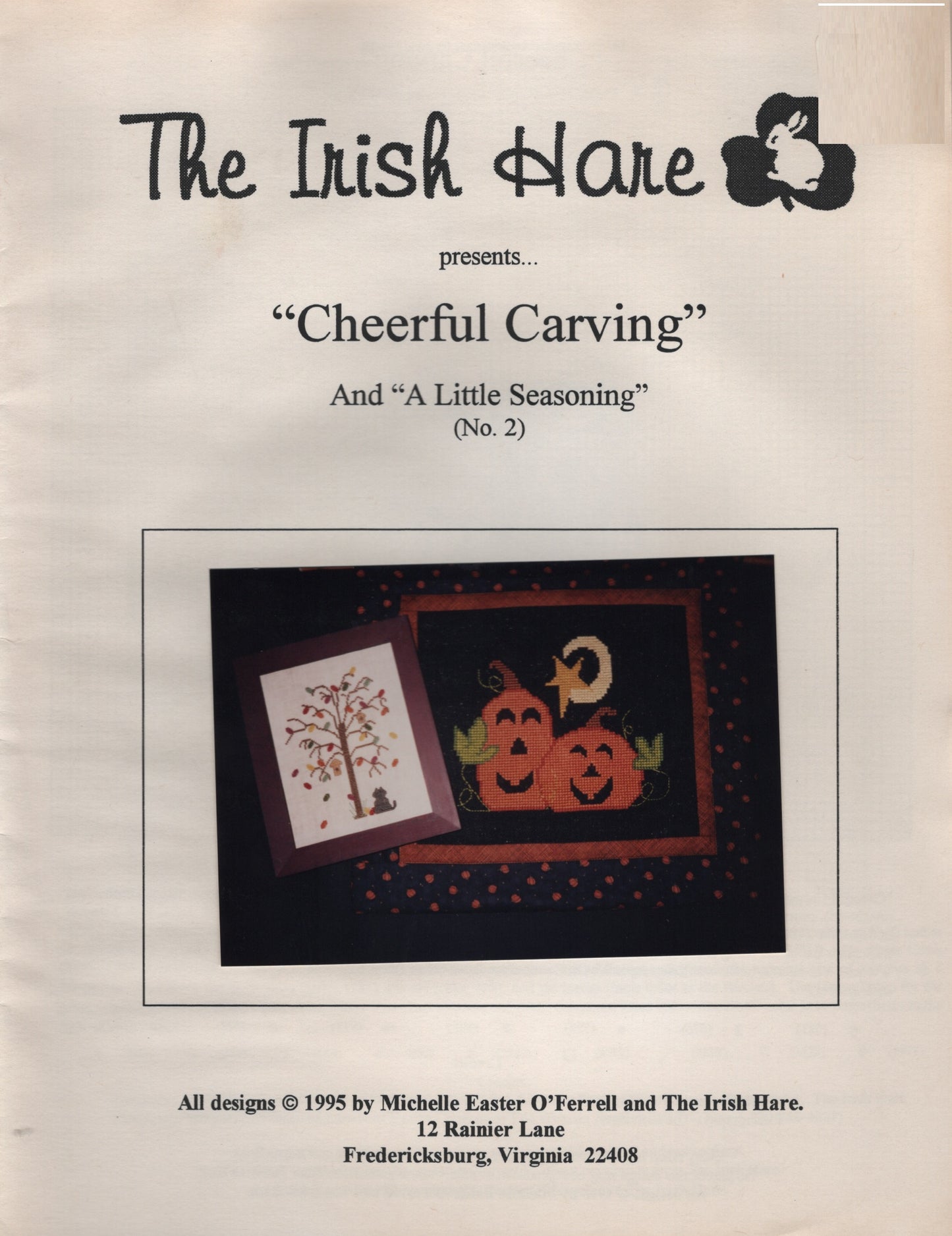 A printed pattern cover titled "Cheerful Carvings' by The Irish Hare halloween pumpkin cross stitch pattern