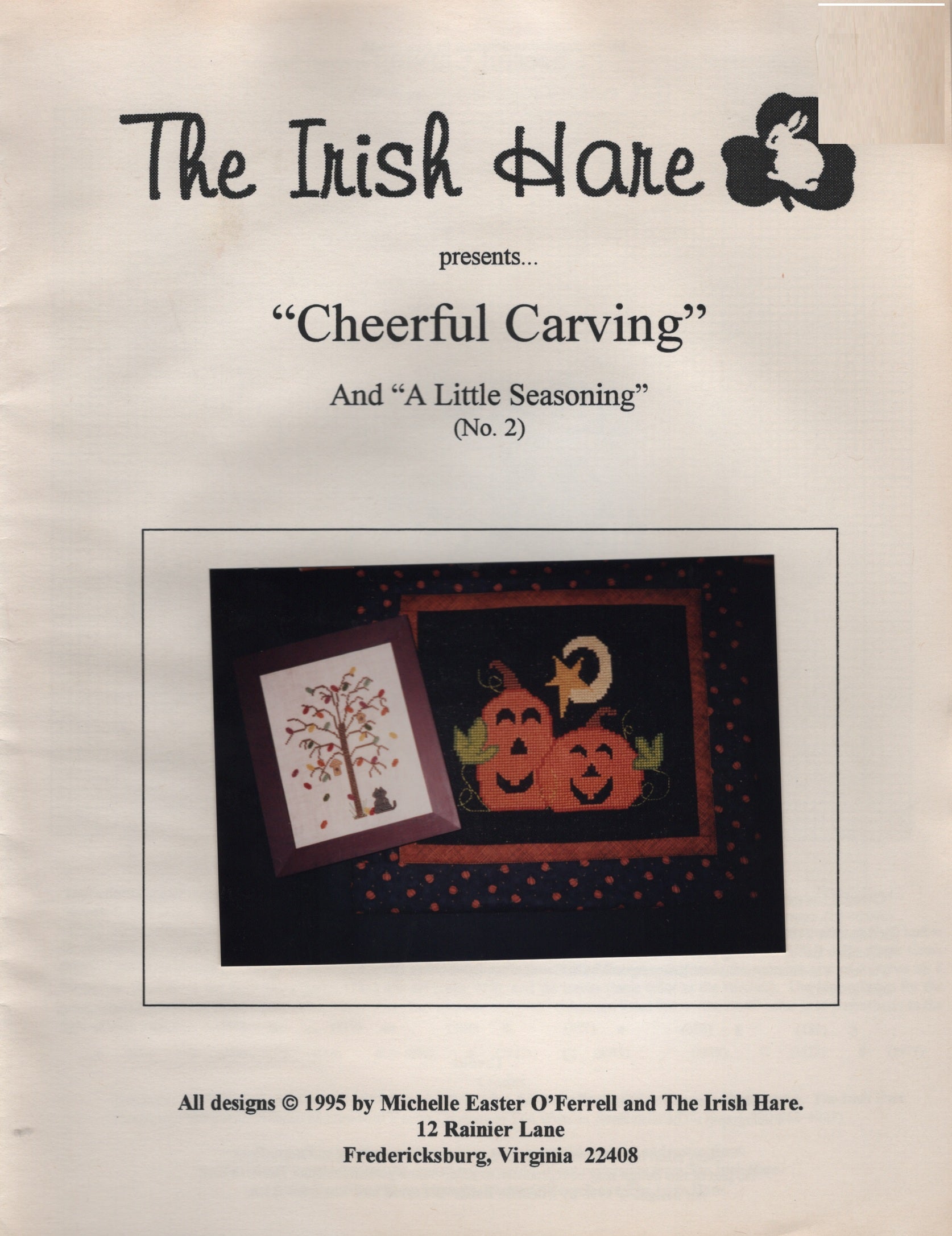 A printed pattern cover titled "Cheerful Carvings' by The Irish Hare halloween pumpkin cross stitch pattern