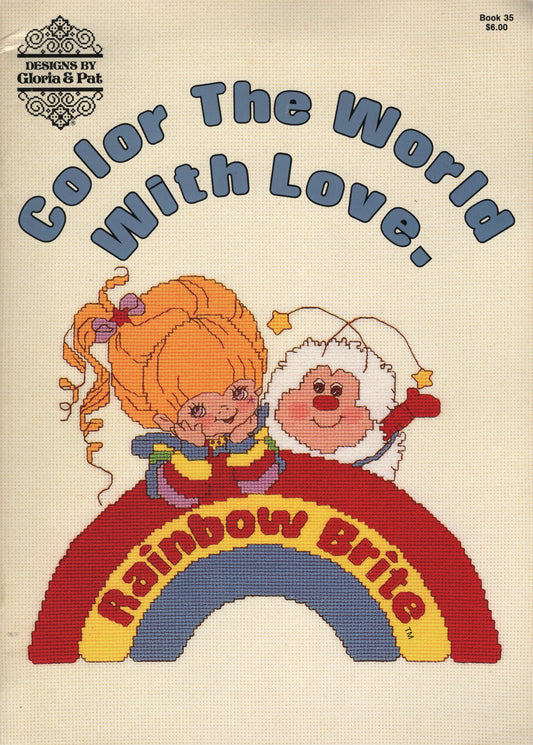 Vintage needlework pattern cover for 'Color The World With Love. Book 35 Rainbow Brite' by Gloria & Pat, 35 cross stitch pattern