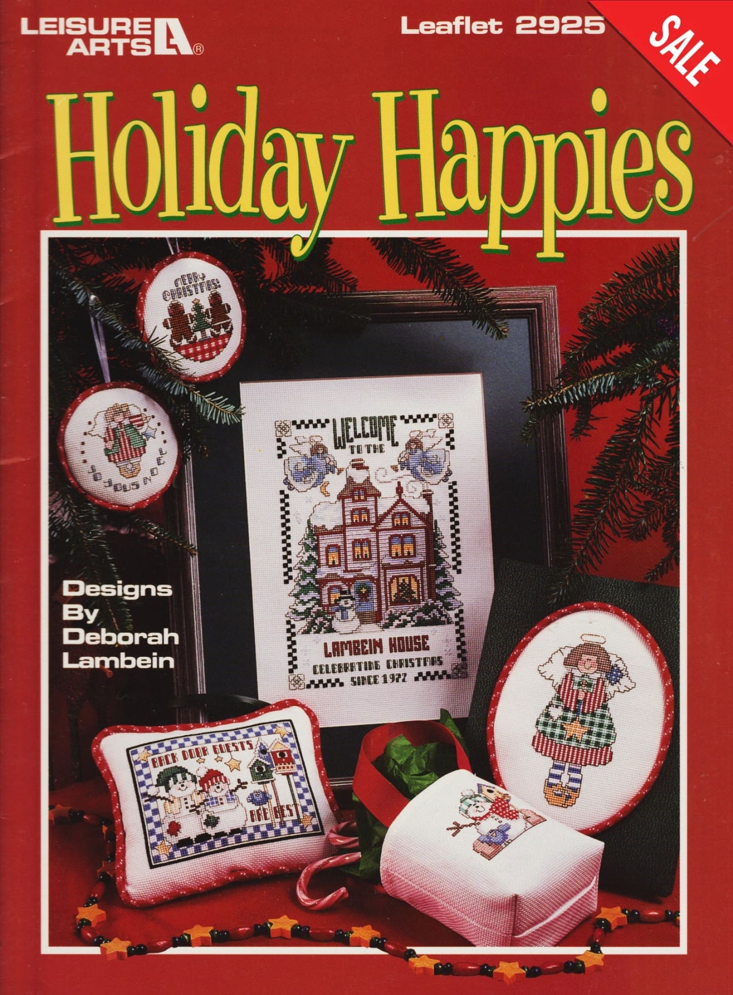 Leisure Arts Holiday Happies 2925 christmas cross stitch pattern