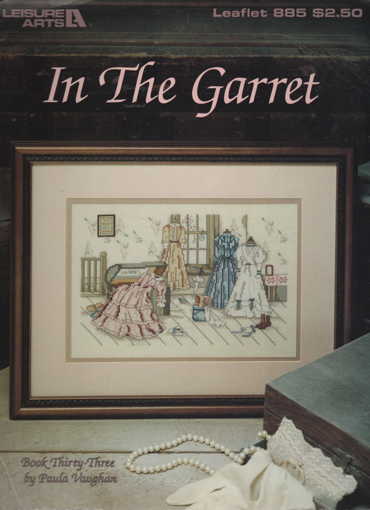 Leisure Arts In The Garret 885 cross stitch pattern