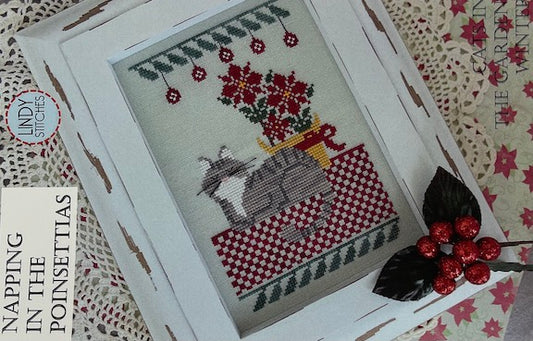 Lindy Stitches Napping in the Poinsettias cross stitch pattern