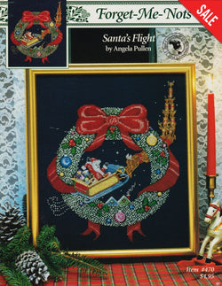 Just CrossStitch Santa's Flight 470 Forget-Me-Nots  christmas cross stitch pattern