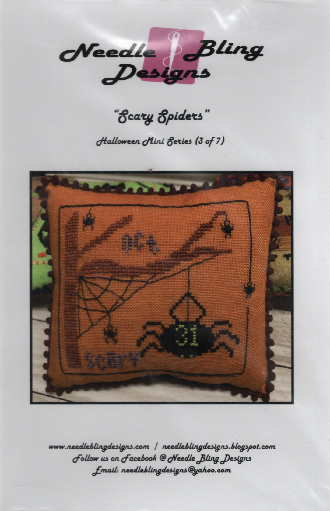 Needle Bling Designs 'Scary Spiders' Halloween Mini Series pillow pattern cover, showing an orange cross-stitch pillow with spider and spiderweb designs. NBD-137