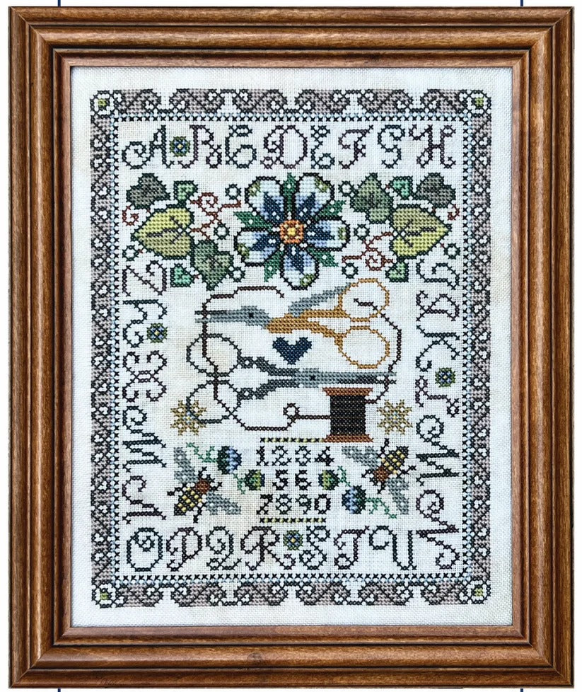 Tellin Emblem Primrose Cottage cross stitch pattern