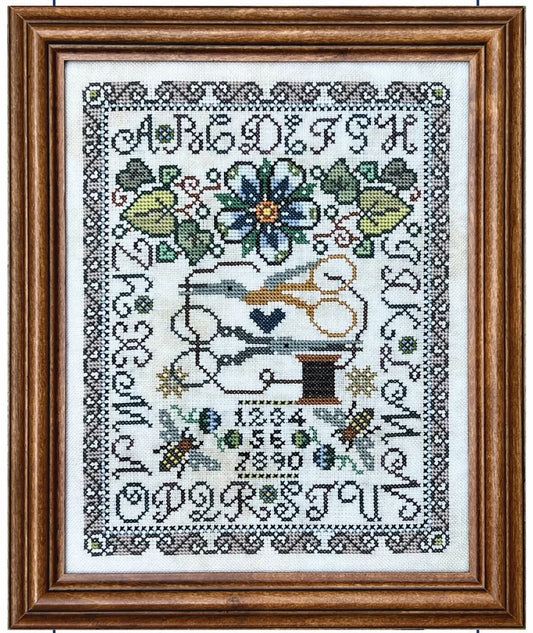 Tellin Emblem Primrose Cottage cross stitch pattern