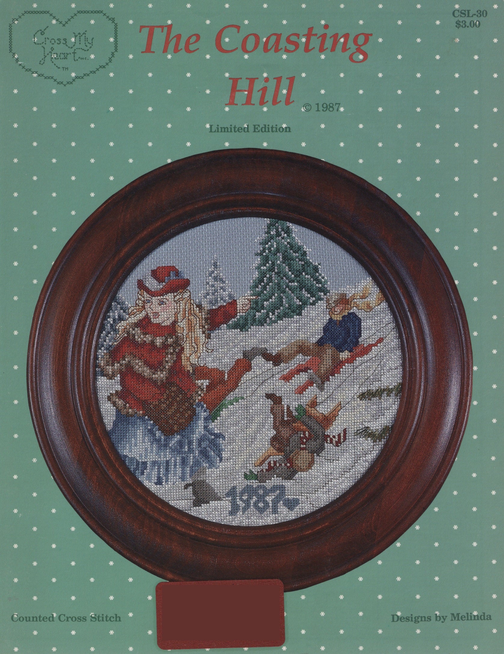 Cross-stitch pattern cover for 'The Coasting Hill' 1987 limited edition, featuring a circular framed cross-stitch design of children sledding in the snow. Cross My Heart CSL-20