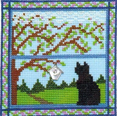 Handblessings Kitty in the Spring Window cat cross stitch pattern