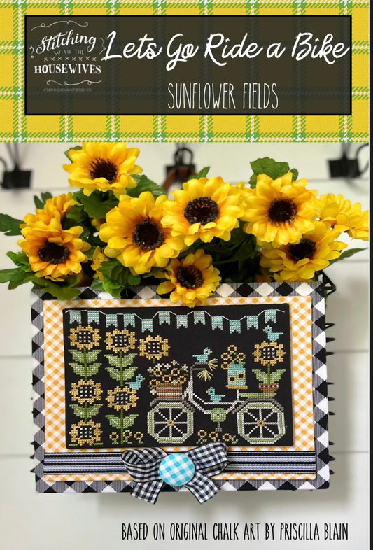 Stitching with the housewives Lets Go Ride a Bike Sunflower Fields cross stitch pattern