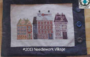Thistles Needlework Village 2013 cross stitch pattern