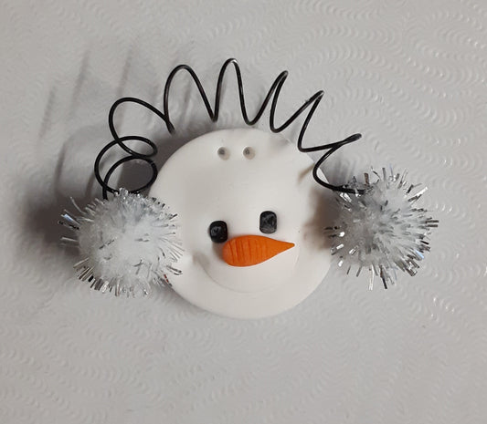 Snowman with Earmuffs button