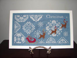 AuryTM Snowy Christmas Quaker Style cross stitch snowflake pattern